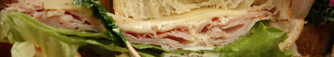 Eating Deli Sandwich Bakery at JT's Bagel Hut restaurant in Forked River, NJ.